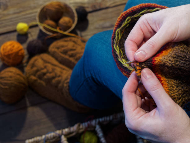 istock Woman is knitting 915178008