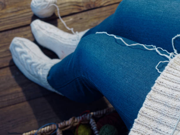 istock Woman is knitting 915178010