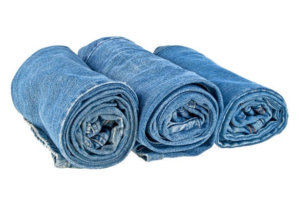 istock Lot of different jeans isolated on white background 915178738