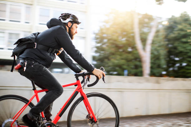 istock Bicycle messenger: commuter with road bicycle in the city 915178864
