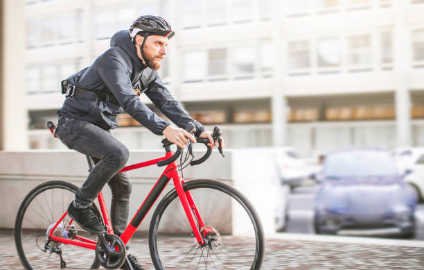 istock Bicycle messenger: commuter with road bicycle in the city 915178876