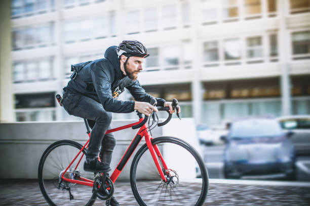 istock Bicycle messenger: commuter with road bicycle in the city 915178918