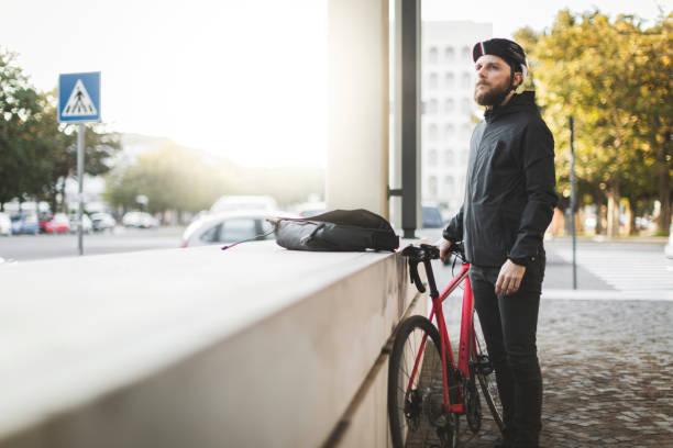 istock Bicycle messenger: commuter with road bicycle in the city 915179028