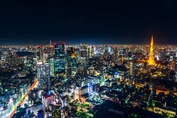 panoramic modern city skyline of skytree and tokyo metropolitan expressway junction at night - roppongi imagens e fotografias de stock