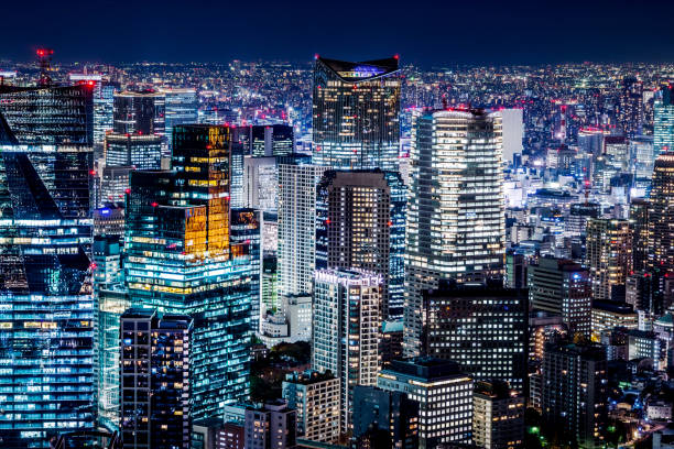 istock panoramic modern city skyline view at neon night 915182270