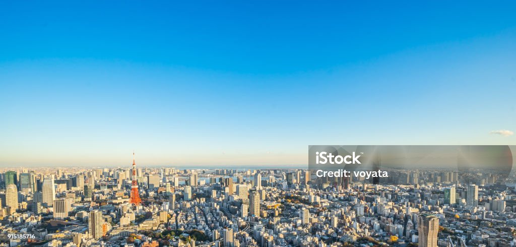 panoramic modern city skyline bird eye aerial view of tokyo tower and odaiba under golden sun Asia Business concept for real estate and corporate construction - panoramic modern city skyline bird eye aerial view of tokyo tower and odaiba under golden sun in Roppongi Hill, Tokyo, Japan Sky Stock Photo