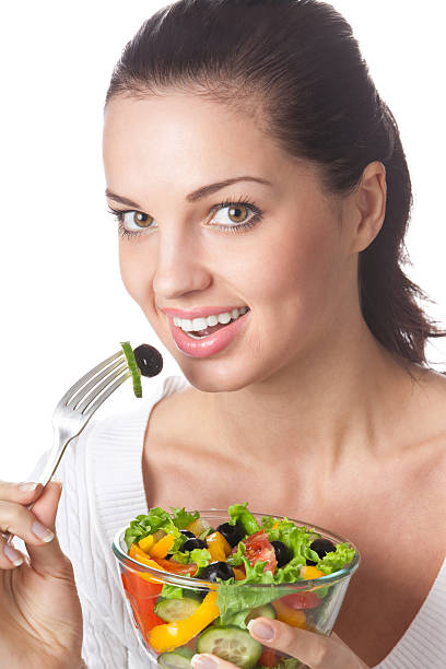 istock Woman with vegetable salad, isolated on white 91518682