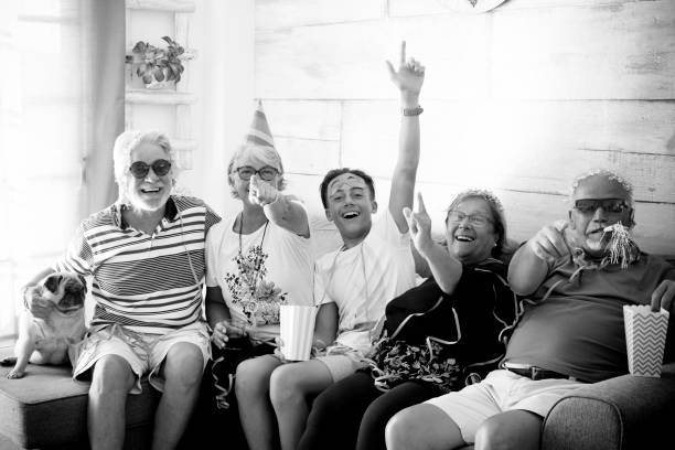 istock family celebrating on the sofa 915188758