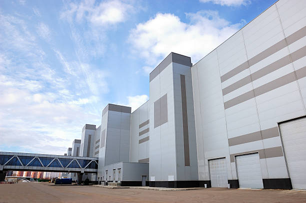 istock Modern side-view industrial building overlooking sidewalk 91518984