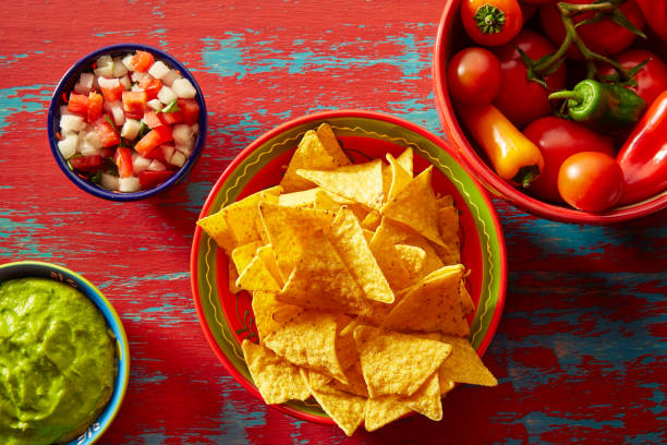 istock Nachos with guacamole pico de gallo sauce 915190556