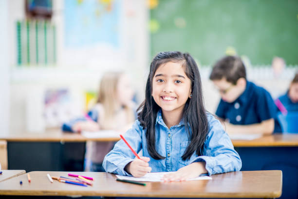 istock Girl With Pencil Crayons 915191526