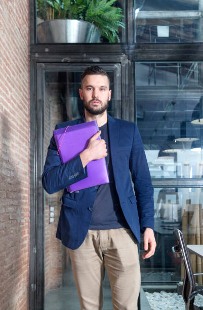 istock Businessman portrait at office 915194114