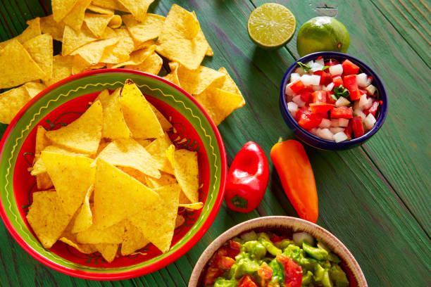 istock Guacamole with avocado tomatoes and nachos 915194724