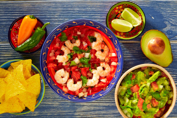 istock Ceviche Camaron shrimp nachos and guacamole 915195158