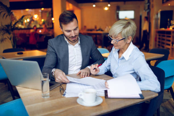 istock Young man explaining his business plans to his colleague 915195254