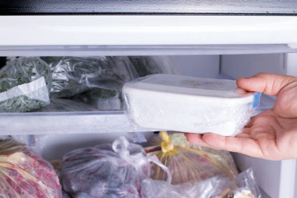 istock Refrigerator with frozen food (meat, milk, vegetables) 915197408