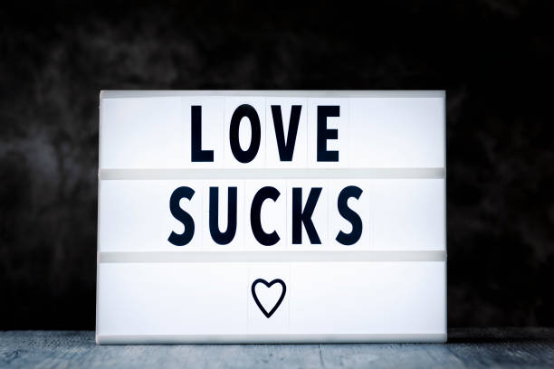 istock text love sucks in a lightbox 915201602