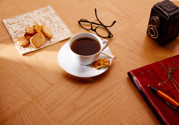 istock Morning breakfast coffee with vintage red notebook 915202326
