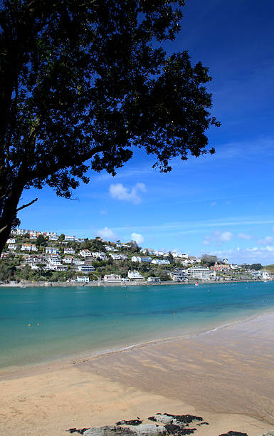 istock Clear waters on a sandy beach with a view of a small town 91520399