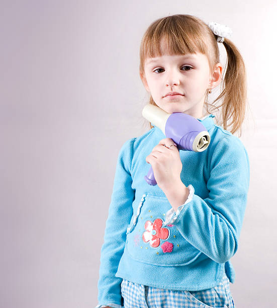 istock girl with toy drier 91520478
