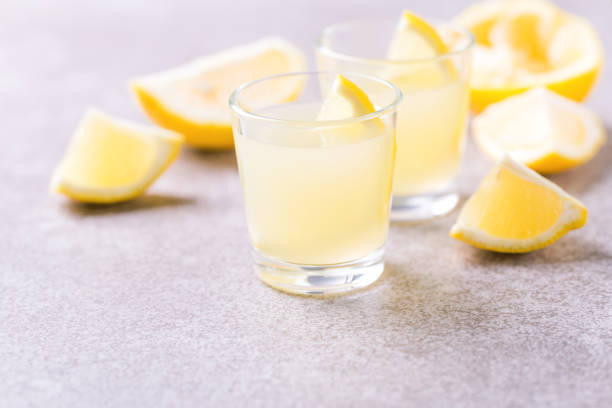 istock Italian lemon lime liqueur limoncello with ice and mint 915205578