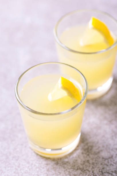istock Italian lemon lime liqueur limoncello with ice and mint 915205898