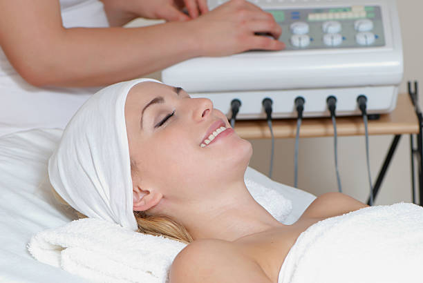 istock lovely lady in massage salon 91520637