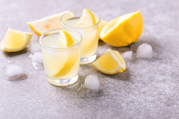 istock Italian lemon lime liqueur limoncello with ice and mint 915206646
