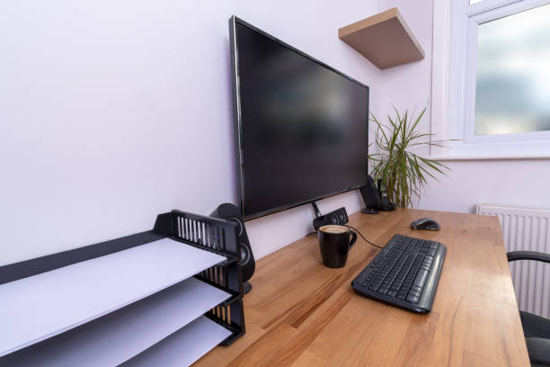 istock Paper trays on computer desk in home office 915206914