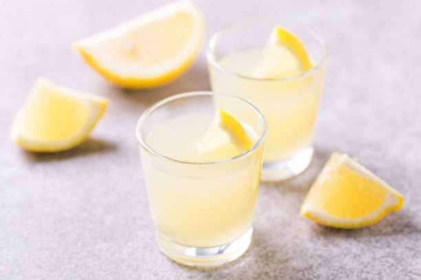 istock Italian lemon lime liqueur limoncello with ice and mint 915206958