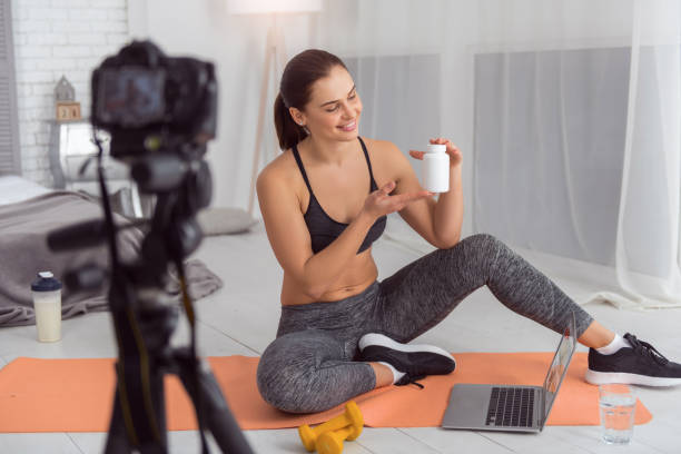 istock Happy blogger making a video for her followers 915210100