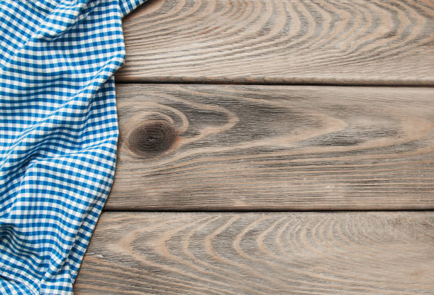 istock Checkered napkin on a wooden background 915212794