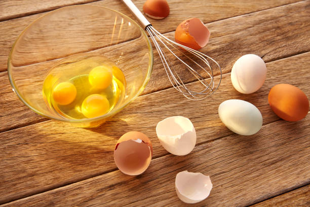 istock Eggs and shaker on wood with blue easter white and brown 915214302