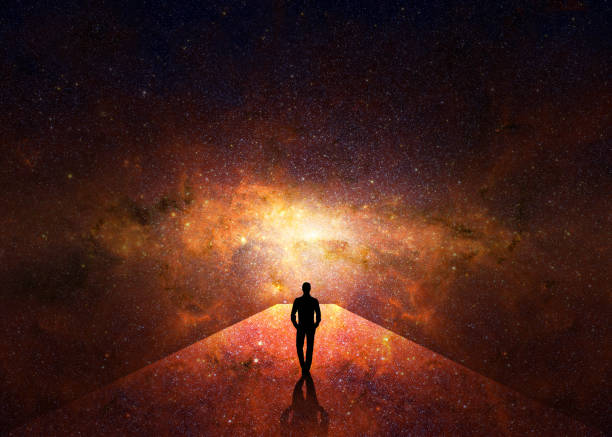 Path to light Human silhouette on a path or passageway facing the light of the universe reincarnation stock illustrations