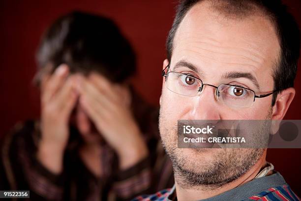 Upset Woman And Guilty Man Stock Photo - Download Image Now - Adult, Anger, Arguing