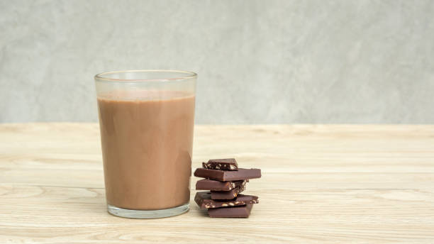 istock Chocolate milk on a wooden table. 915227218