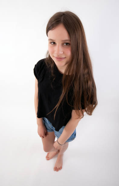 istock young girl looking up 915233112