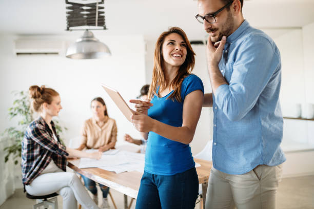 istock Image of business partners discussing documents and ideas 915233218