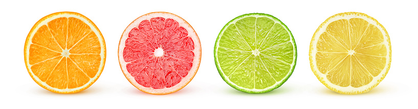 Fresh and ripe sliced citrus fruits. Slices of orange, tangerine, lemon and grapefruit in a wooden plate on a dark background. Fresh and colorful concept