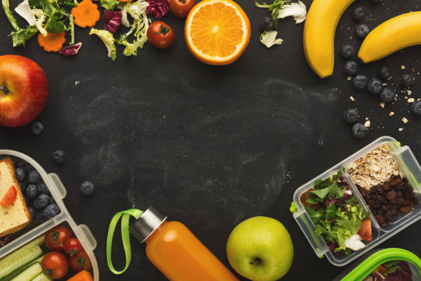istock Fruits and vegetables assortment on black background with copy space 915236798