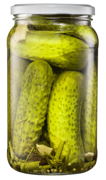 istock Pickled cucumbers in the glass can. 915243814