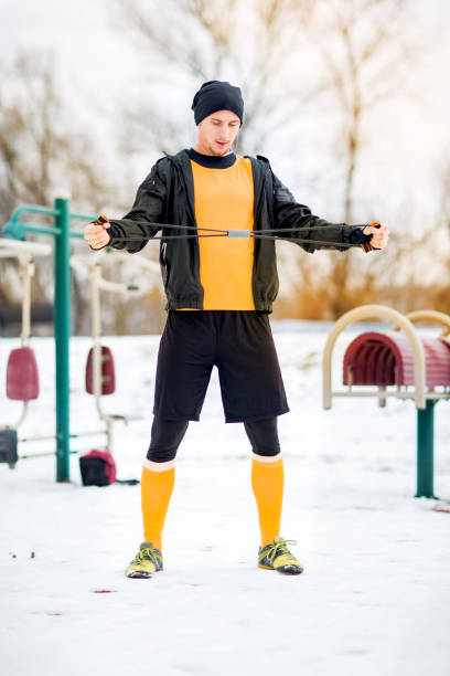istock Athlete is stretching in the park. 915247594
