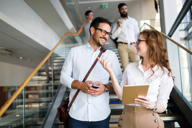 istock Business people having fun in office 915250432