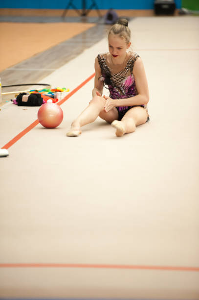 istock Young Rhythmic Gymnastics Athlete Warming Up 915251430