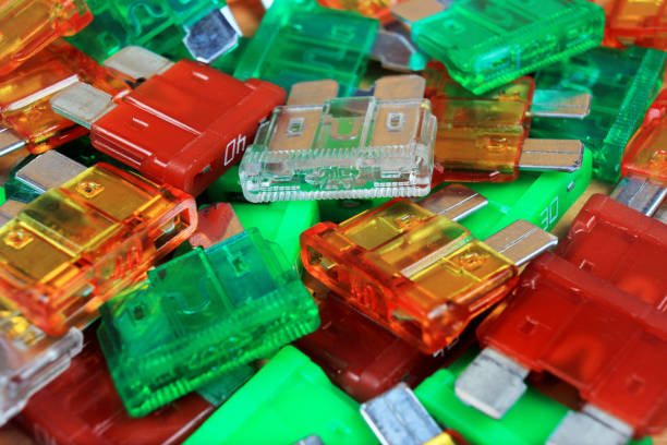 istock Car fuses as electrical background 915251474