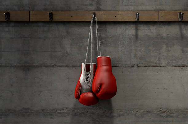 istock Boxing Gloves Hanging In Change Room 915251590
