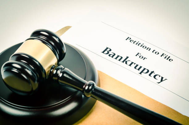 Bankruptcy document with wooden gavel Bankruptcy document with wooden gavel, Business concept. broke stock pictures, royalty-free photos & images