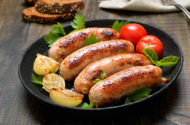 istock Barbecue sausages in frying pan 915256848