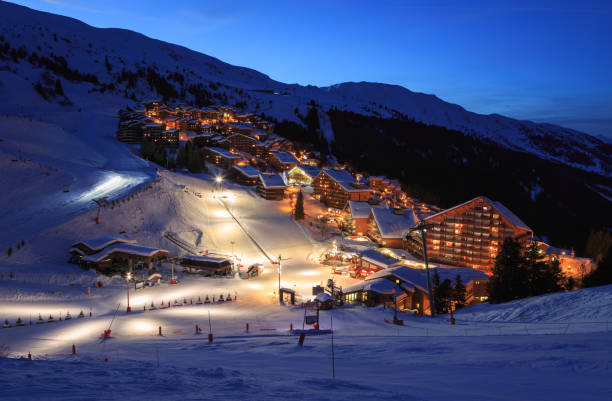 Meribel at night The slopes of a ski resort (Meribel - Mottaret, France) in the evening. savoie photos stock pictures, royalty-free photos & images