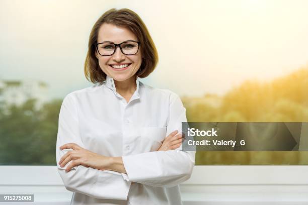 Portrait Smiling Medical Woman Doctor At Hospital Stock Photo - Download Image Now - Nutritionist, Adult, Adults Only
